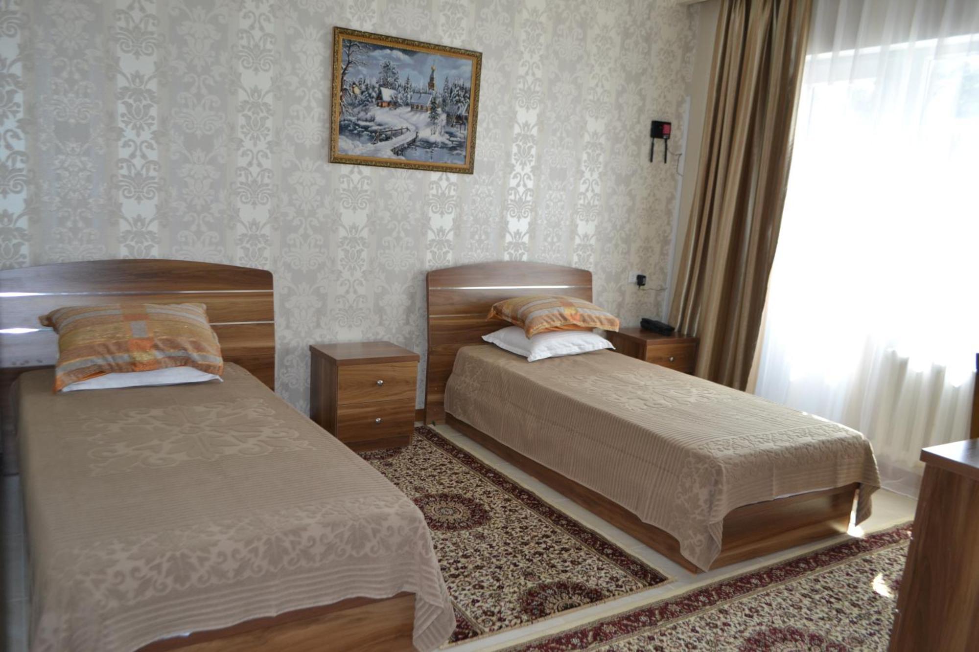 Gostinitsa Grand Hotell Kyzylorda Rum bild